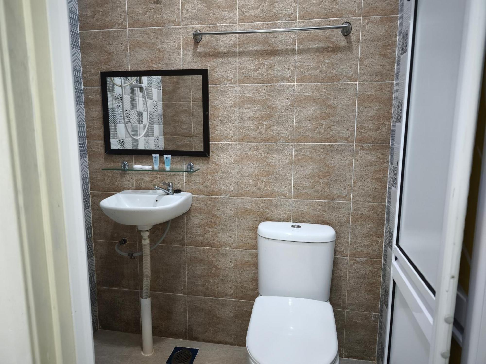 קמפונג גונג בדק The Serai Cottage Transit Hotel חדר תמונה