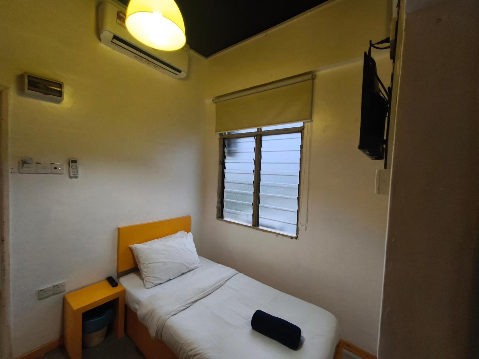 קמפונג גונג בדק The Serai Cottage Transit Hotel חדר תמונה